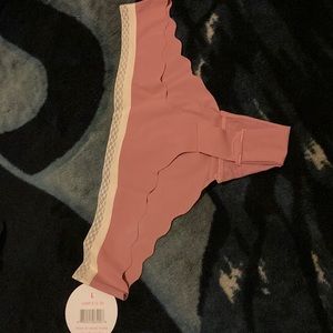 Splendies soft pink laser cut thong with cute cream colored lacing in the trim